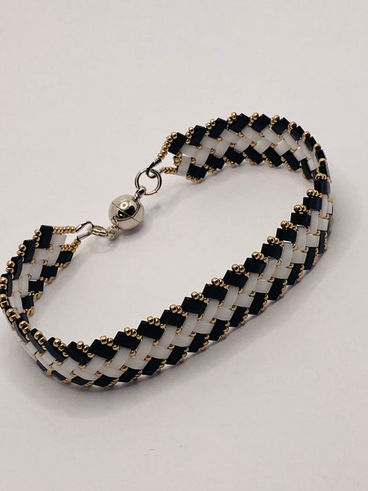 Black white and gold beaded bracelet