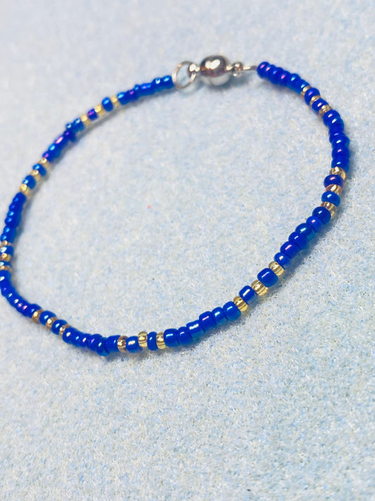 Blue and gold beaded bracelet
